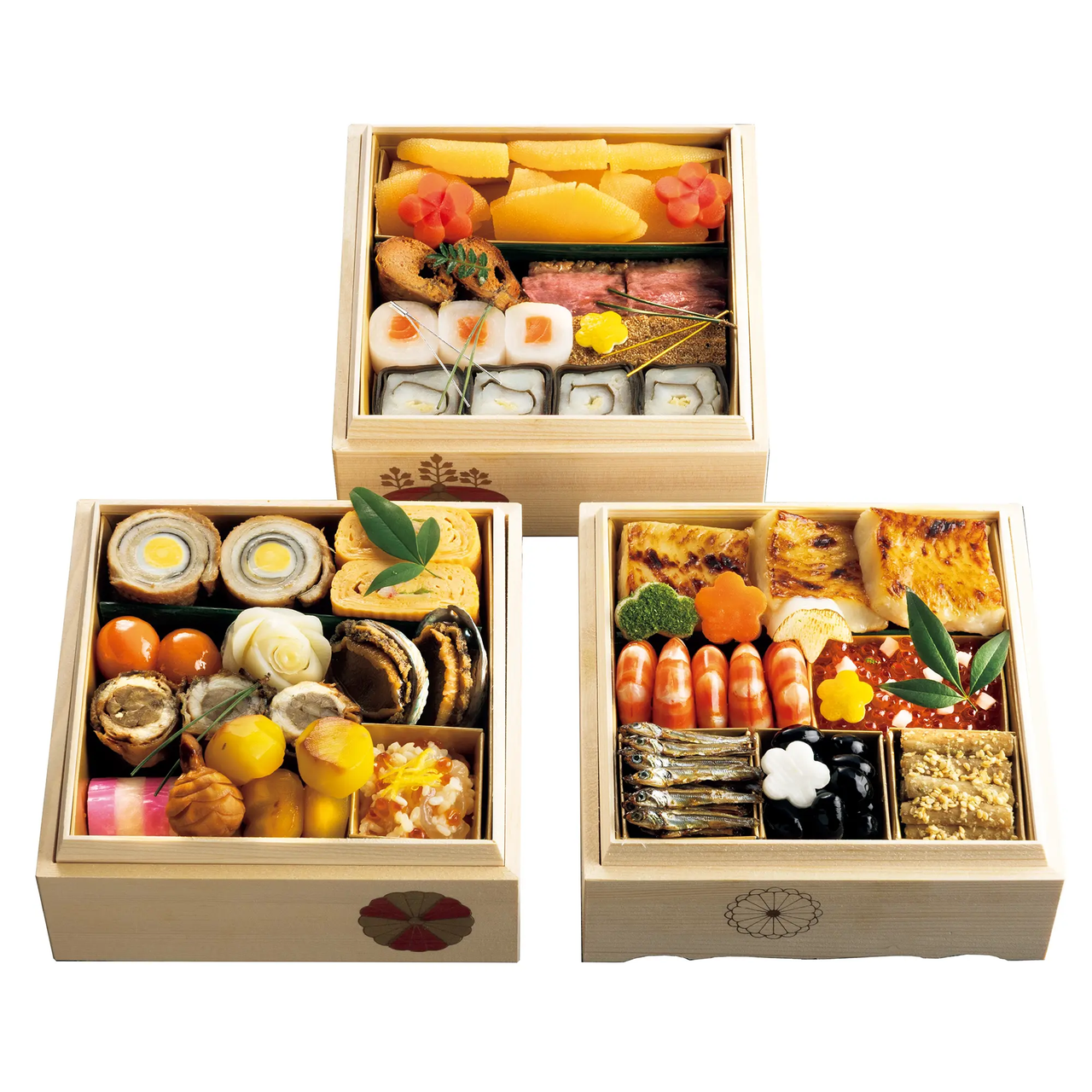 「菊乃井 和三段重」 木製の重箱に、寿司、野菜、焼き物など、色とりどりの日本料理が詰められ、美しく盛り付けられています。