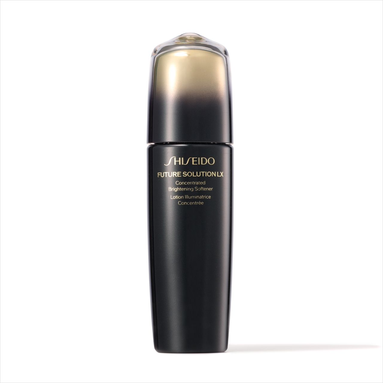 白い背景に映える、グラデーションゴールドのキャップが付いた〈資生堂〉SHISEIDO フューチャーソリューション LX コンセントレイティッド ブライトニングソフナーのシックなブラックボトル。