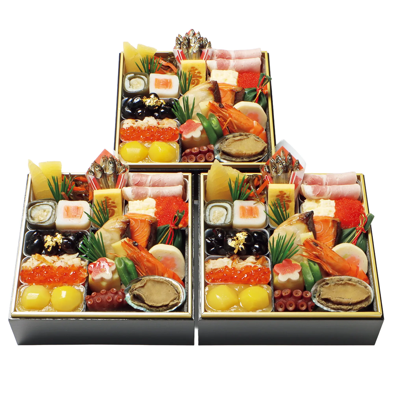 Three stacked boxes of traditional Japanese New Year osechi-ryori, featuring a variety of colorful seafood, vegetables, and festive garnishes.