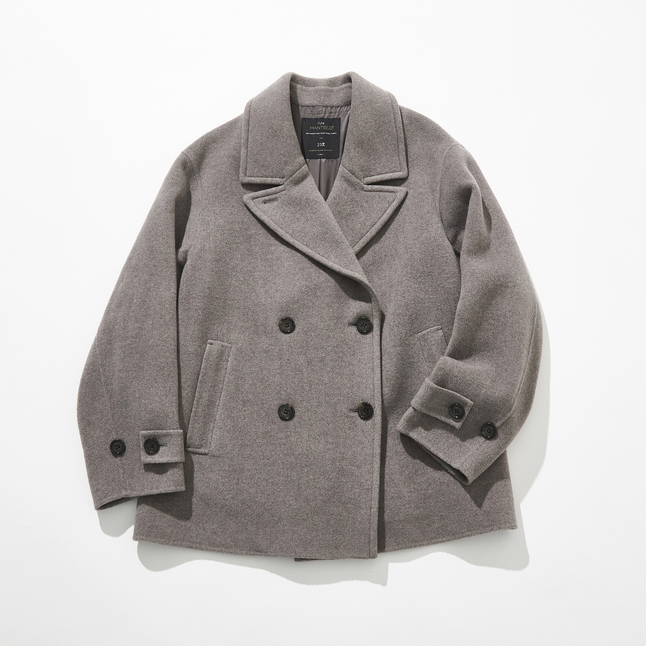 A gray double-breasted wool coat with a wide collar and black buttons, displayed against a white background.