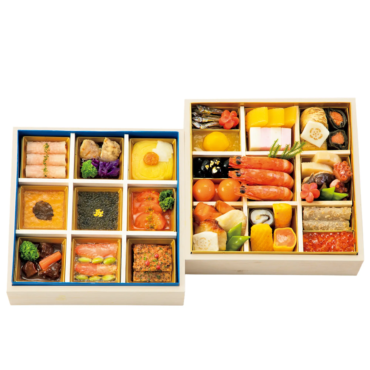 Two bento boxes filled with various colorful Japanese dishes, including seafood, vegetables, rice, and sushi, neatly arranged in compartments.