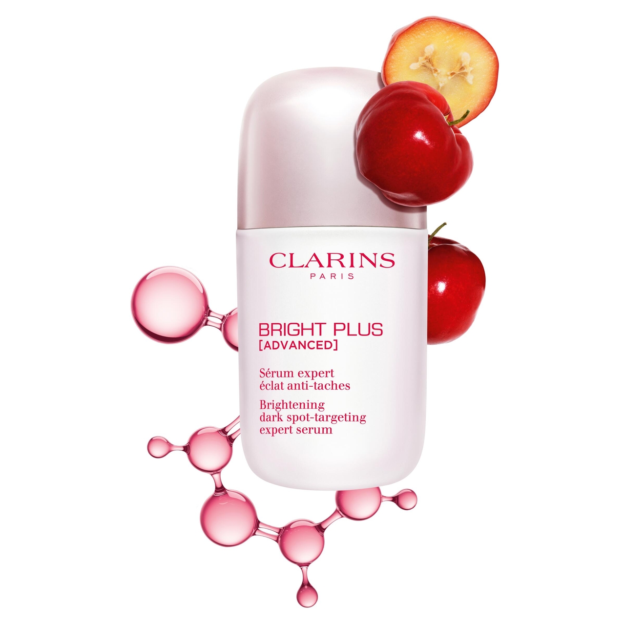 A bottle of Clarins Bright Plus Advanced serum, surrounded by red apples and pink molecular structures, promoting brightening and dark spot targeting.